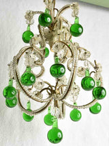 Green pendants on steel antique chandelier