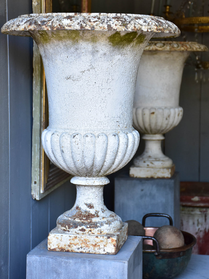 Four white antique French garden urns