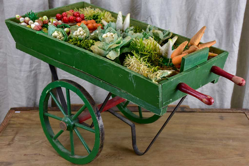 French children's toy wheelbarrow with handmade fruit and vegetables