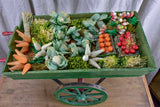 French children's toy wheelbarrow with handmade fruit and vegetables