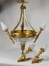 Early twentieth century torch chandelier with matching pair of wall sconces