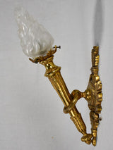 Early twentieth century torch chandelier with matching pair of wall sconces