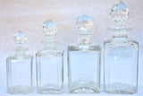 Four 1920's Baccarat perfume flasks