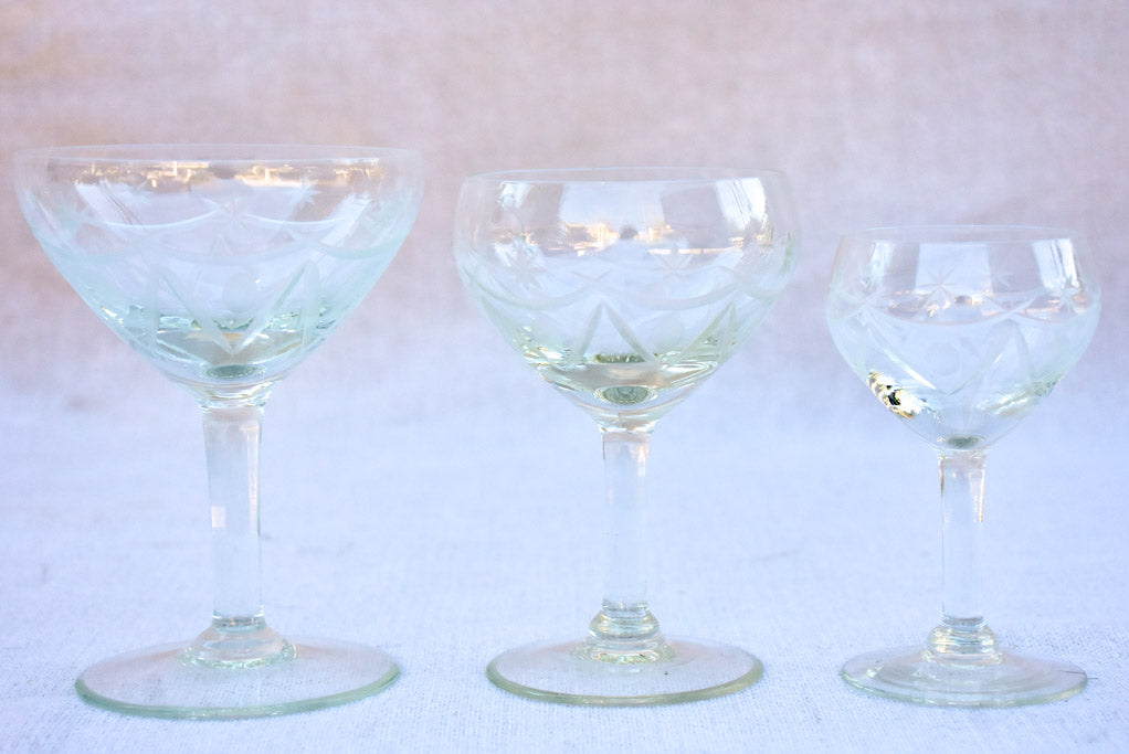 Set of antique French crystal wine and digestif glasses with pretty  engravings