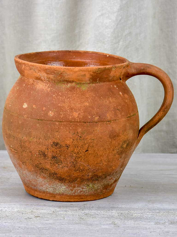 Early 20th century French terracotta pot with handle form Ardeche