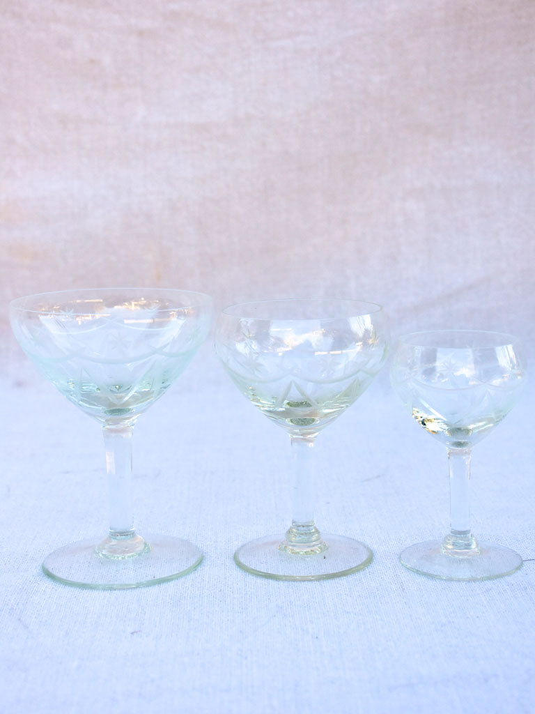 Set of antique French crystal wine and digestif glasses with pretty engravings