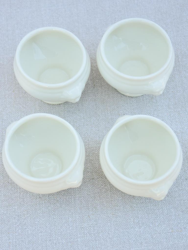 Four miniature earthenware cream bowls
