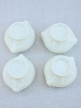 Four miniature earthenware cream bowls