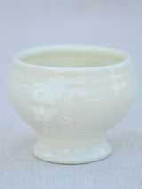 Four miniature earthenware cream bowls