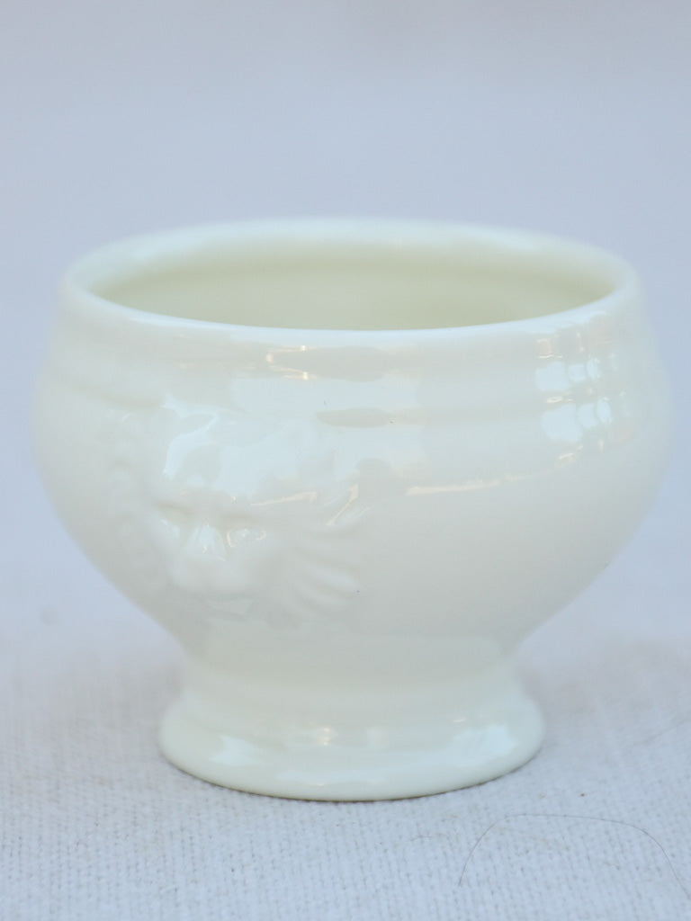 Four miniature earthenware cream bowls