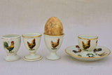 Four 1920's French porcelain egg cups with chicken and rooster transfers