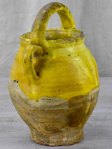 Late 19th Century French water pitcher with yellow glaze