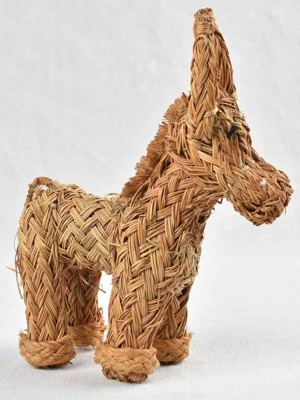 Adorable vintage straw donkey sculpture