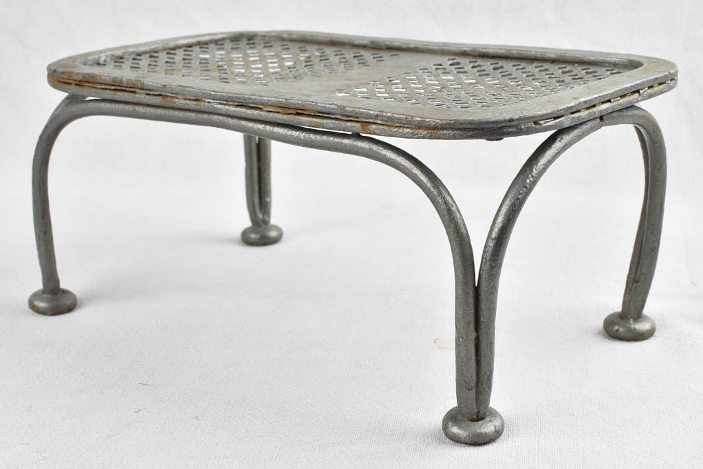 Pair of antique wrought iron garden footrests 12½"