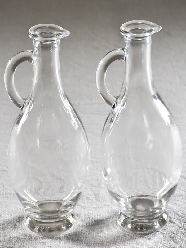 Pair of oil / vinaigrette glass pitchers