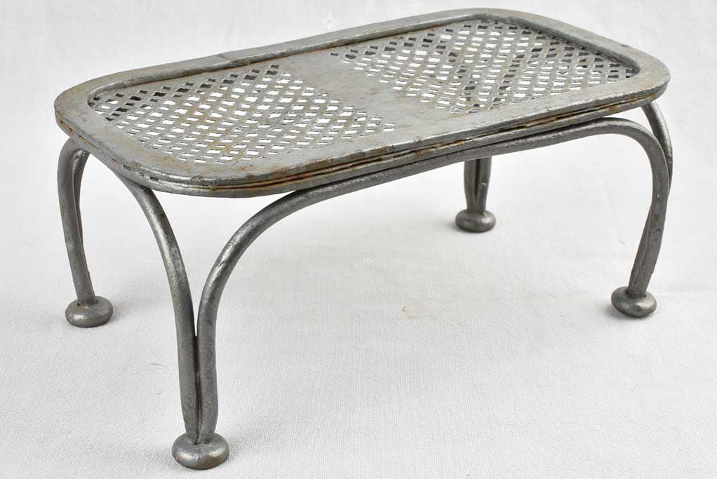 Pair of antique wrought iron garden footrests 12½"