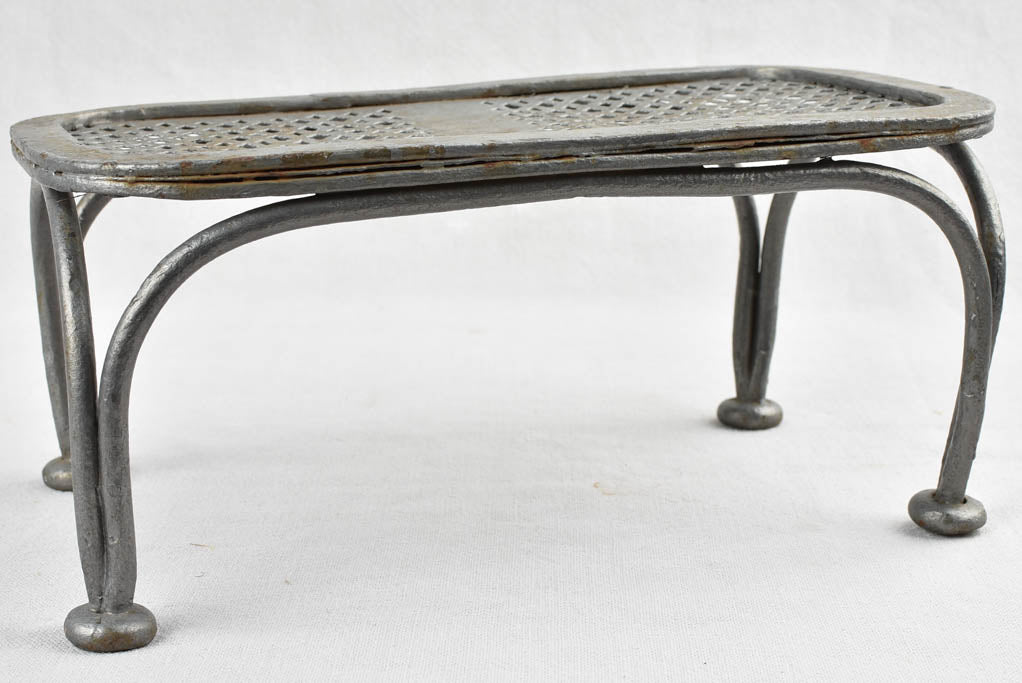 Pair of antique wrought iron garden footrests 12½"