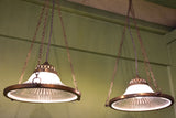 Pair of Verre Holophane suspended lights