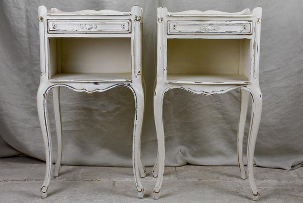 Pair of vintage French nightstands with white patina