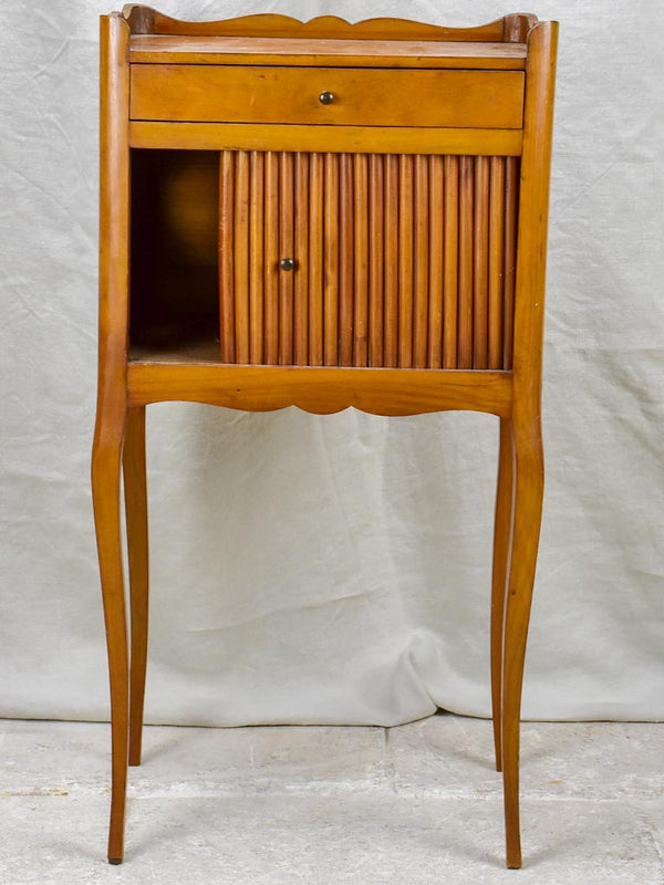 Mid century French nightstand in cherry wood with concertina door