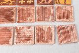 Collection of handmade tiles - ocher and brown