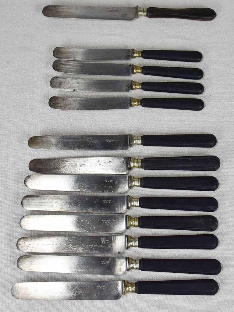 Collection of antique French knives with black handles