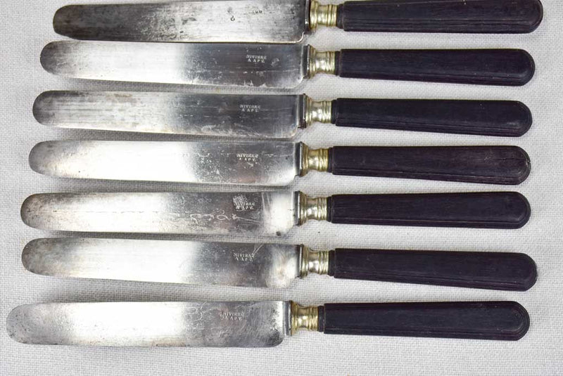 Collection of antique French knives with black handles