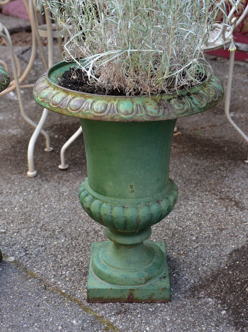 Pair of green cast-iron Medici garden urns