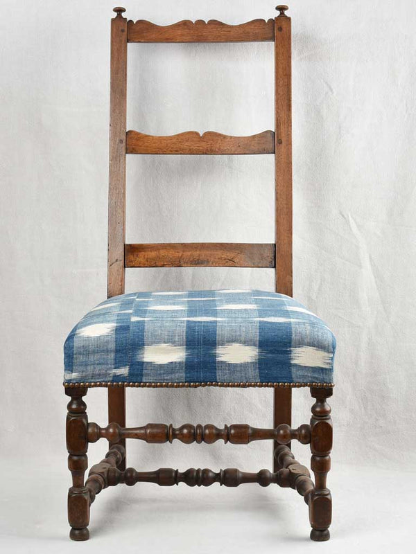 17th century ladderback chair with blue toile de Nîmes upholstery