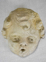 Stone sculpture of an angel's face from a fountain 5½"