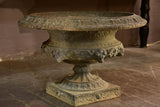 Large grey Medici urn with lions heads
