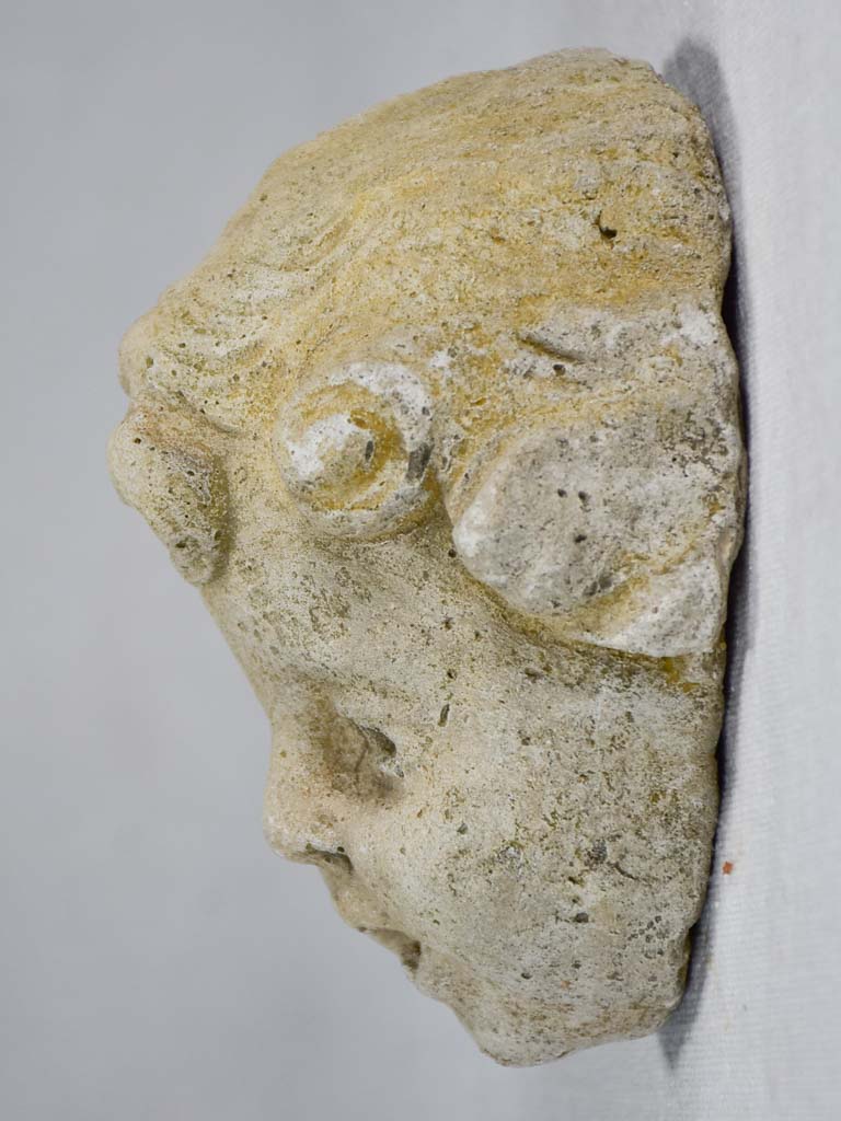 Stone sculpture of an angel's face from a fountain 5½"