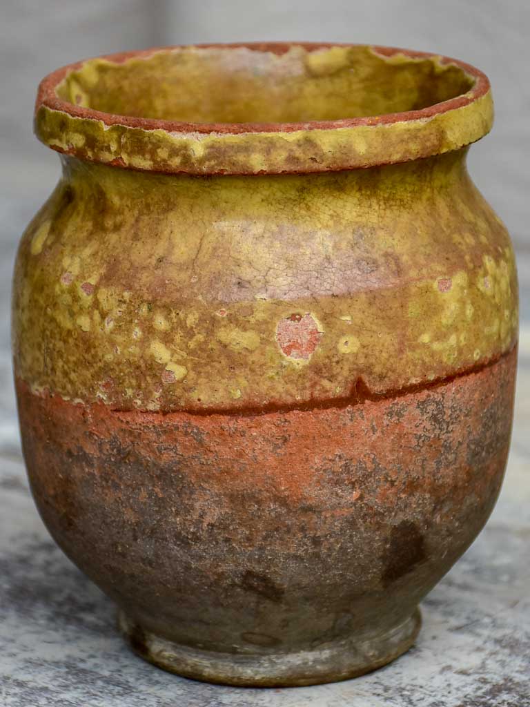 Antique French cup with yellow glaze