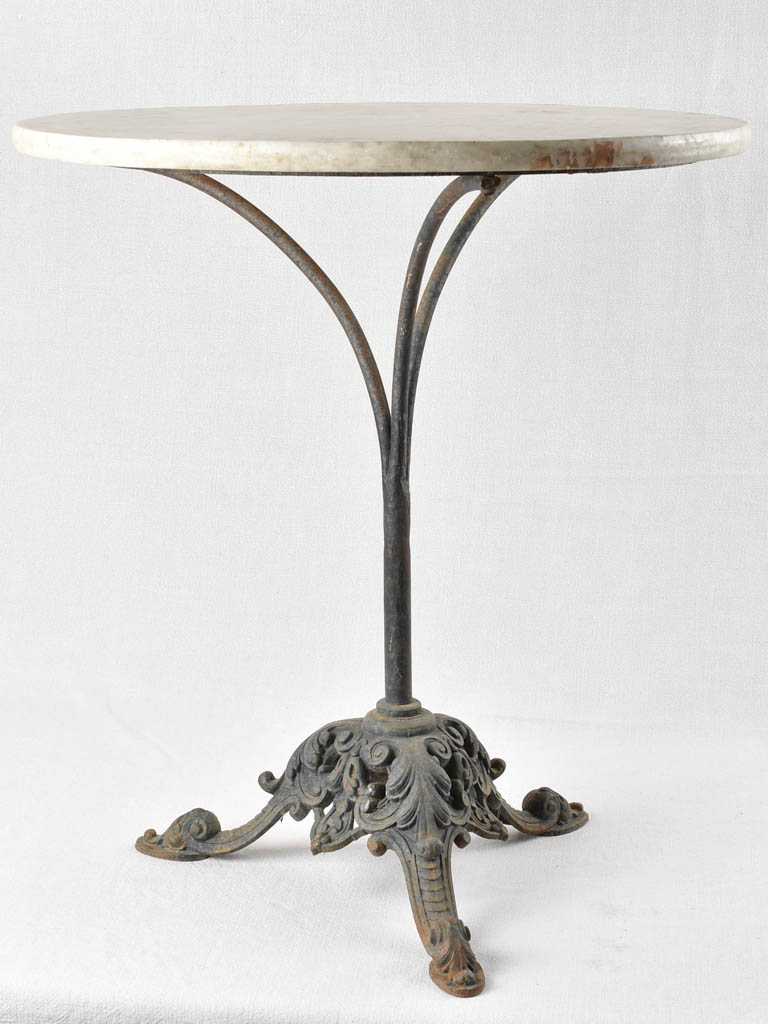 Antique cast iron bistro table with marble top