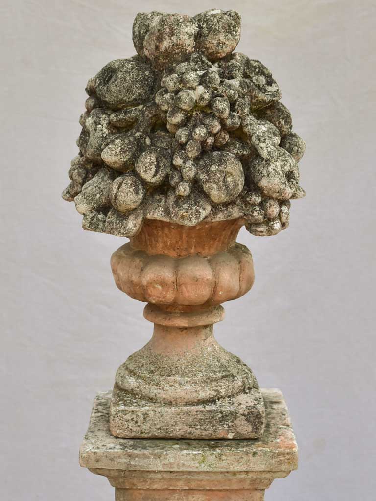 Pair of French concrete columns with fruit baskets 51"