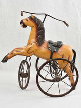 Decorative vintage toy horse tricycle
