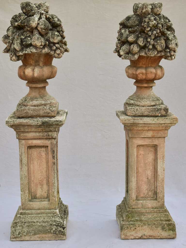 Pair of French concrete columns with fruit baskets 51"