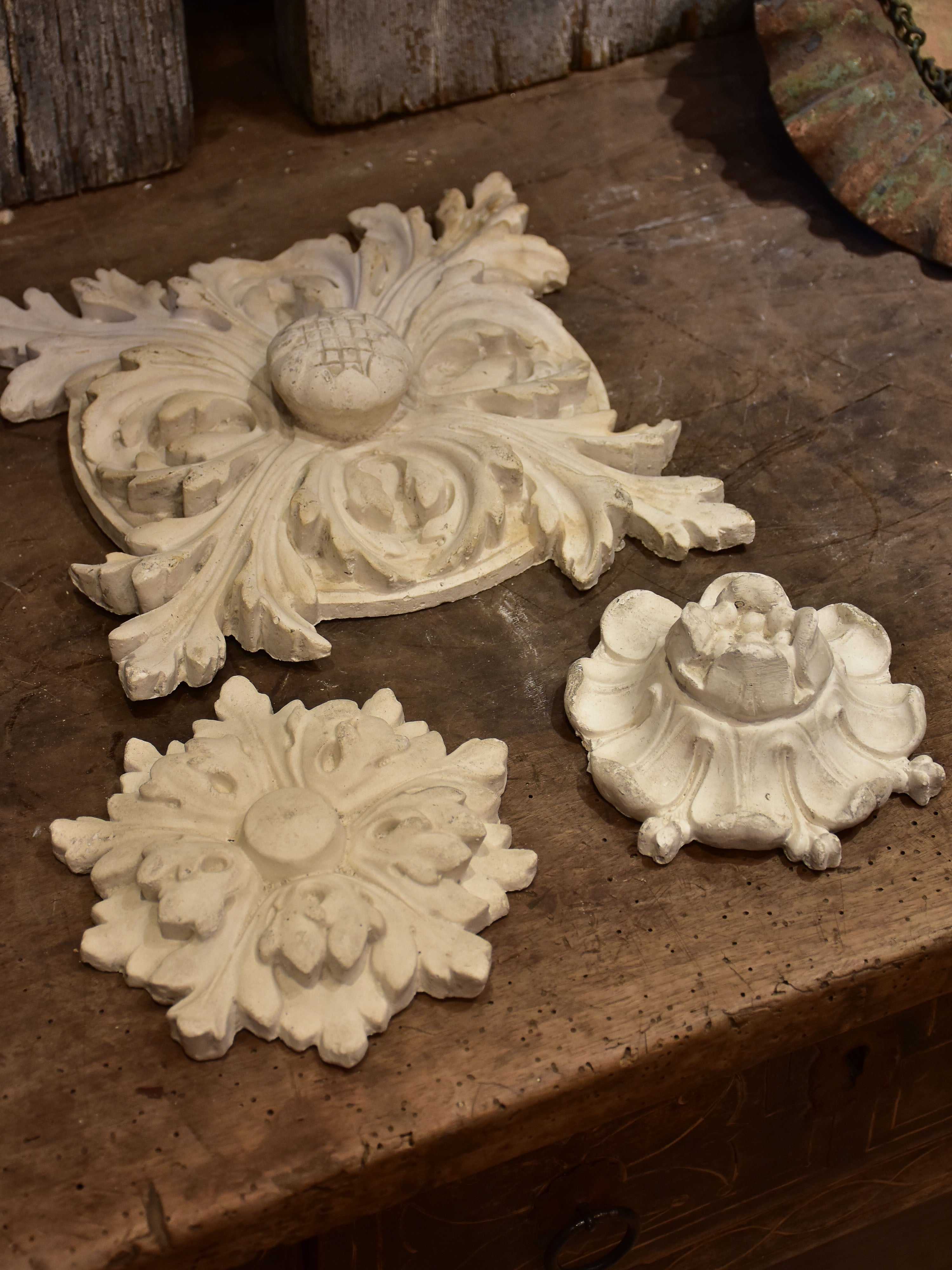 Three antique French plaster ceiling roses
