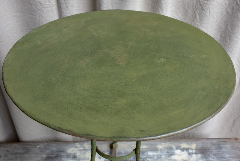 Antique French garden table with green patina