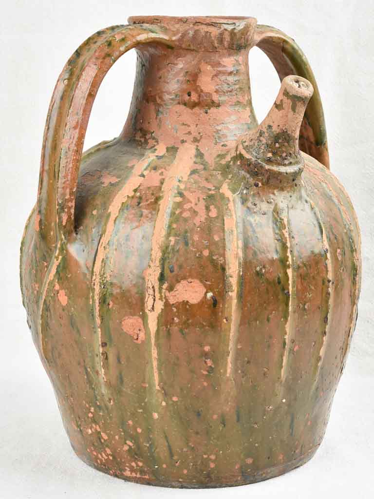 Rustic 19th century walnut oil pitcher 15"