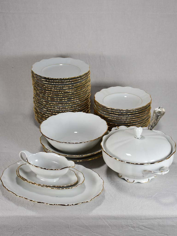 Superb 1960's porcelain dinnerware with gold rim