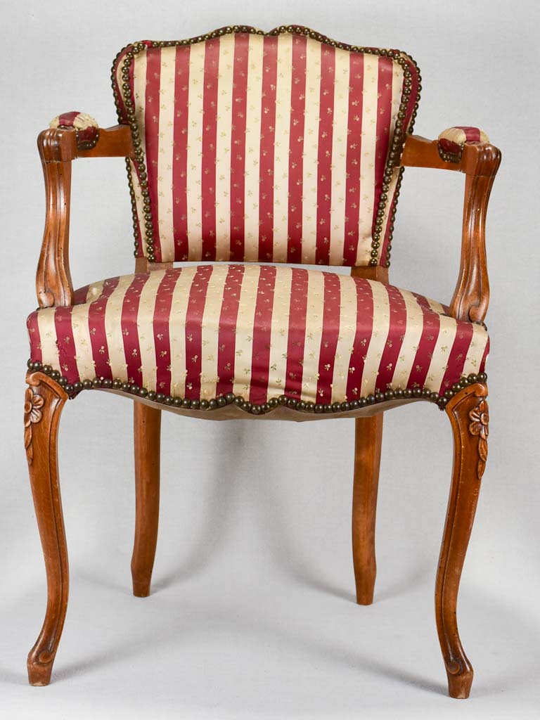 Louis XV-style armchair with red-striped upholstery