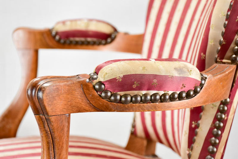 Louis XV-style armchair with red-striped upholstery