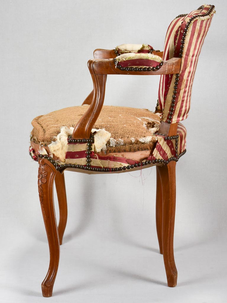 Rustic petite Louis XV-style armchair