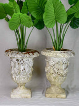 Pair of mid century weathered garden urns with decorative moldings 22"