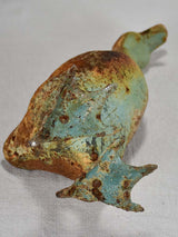 Vintage cast iron duck and oversized snail