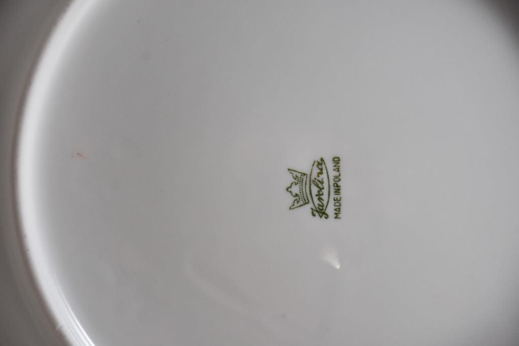 Vintage dinnerware with blue and gold trim