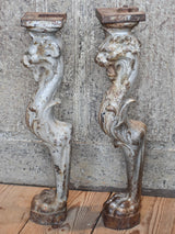 Two console table legs with lion heads and claw feet