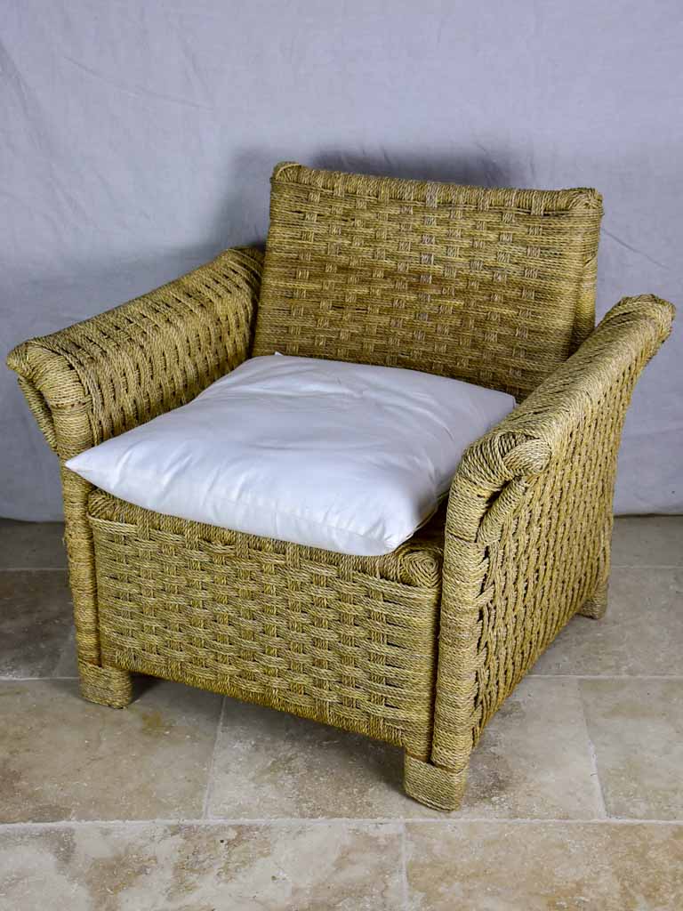 Two vintage rope armchairs and an ottoman