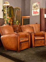 Pair of mustache back vintage French club chairs